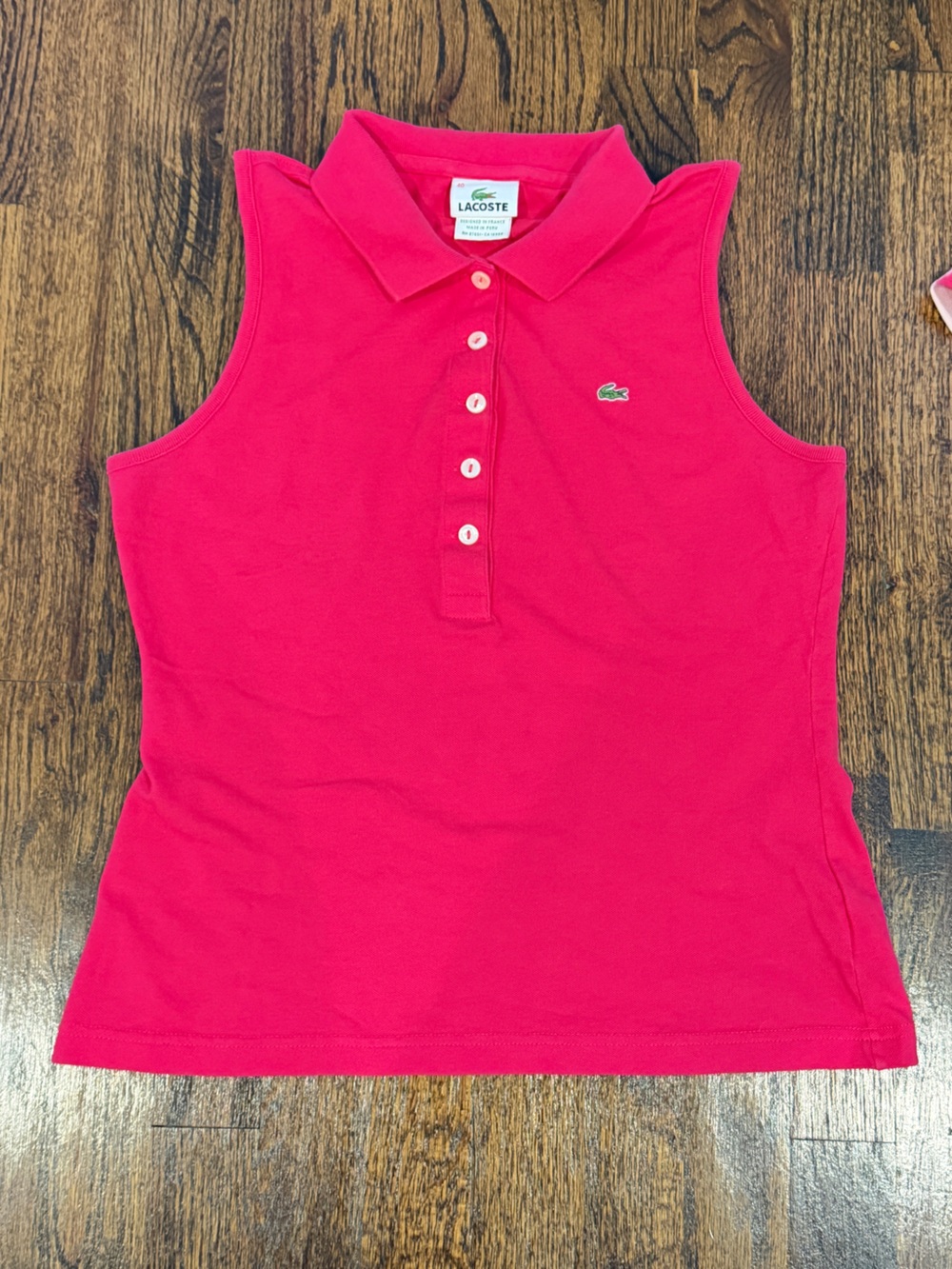 Lacoste Hot Pink Women’s Sleeveless Polo with Green Crocodile